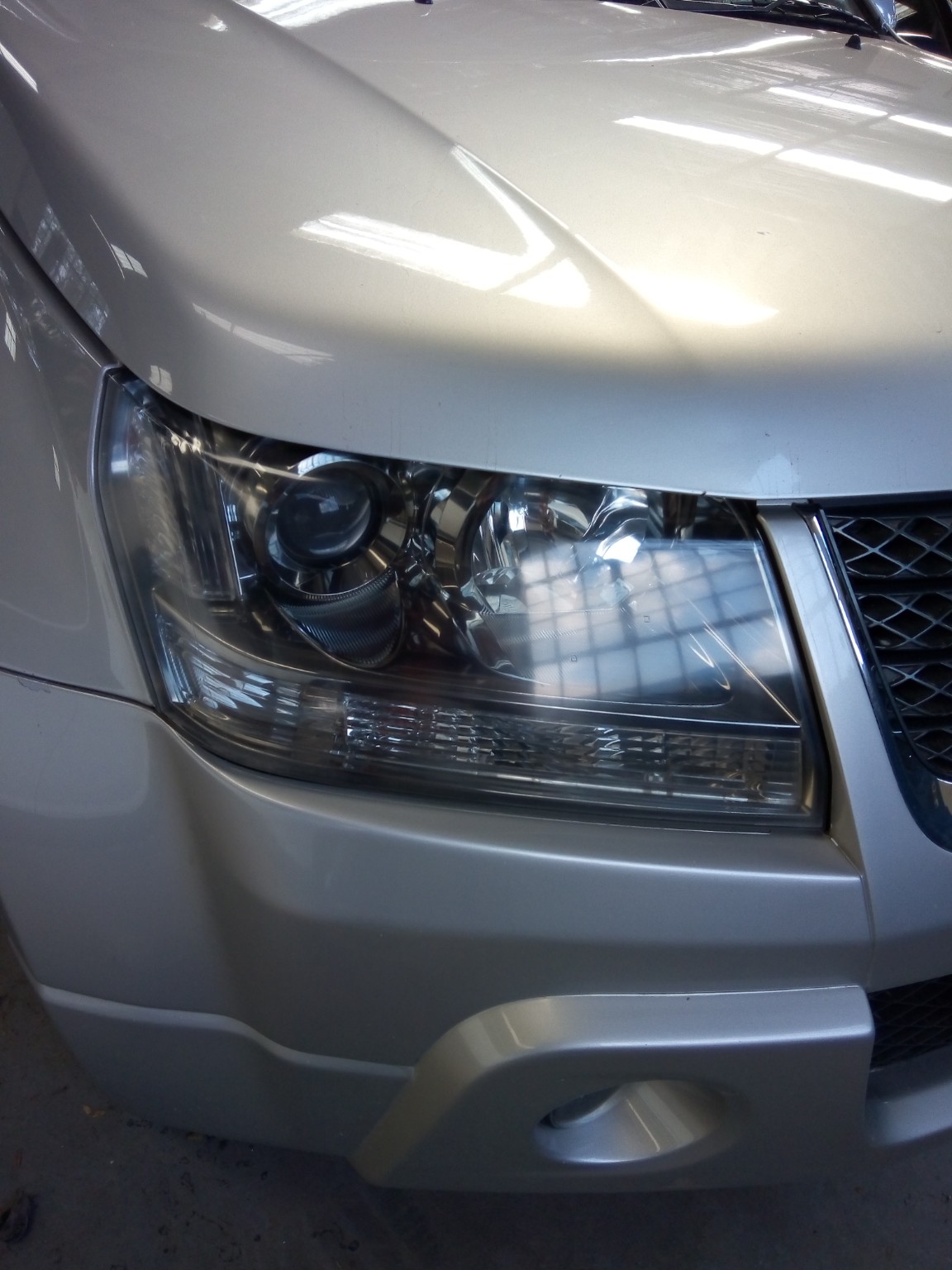 Clear SUV headlight after restoration