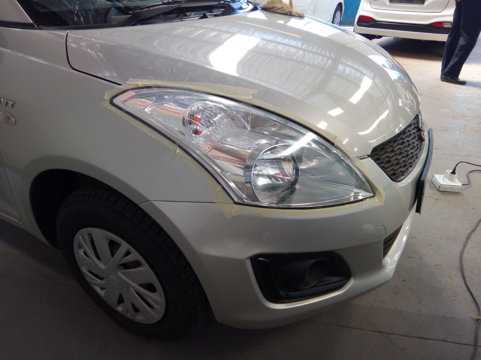 Clear Suzuki Swift headlight after restoration
